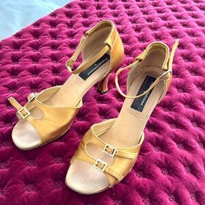 Gold ballroom dance shoes, size 8.5. Worn. Brand is Stephanie Professional.